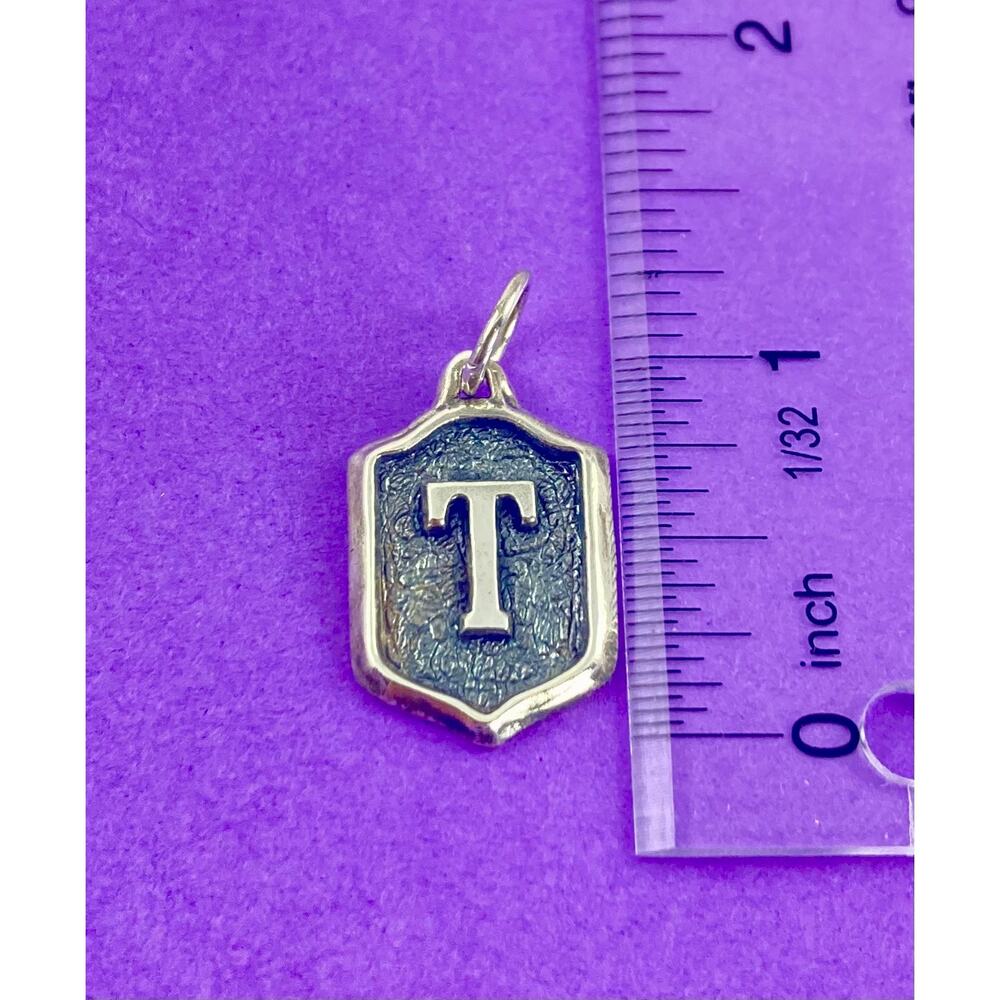 Waxing Poetic Insignia Tag charm